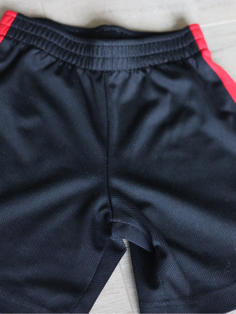 Kids Black Athletic Shorts with Red Trim